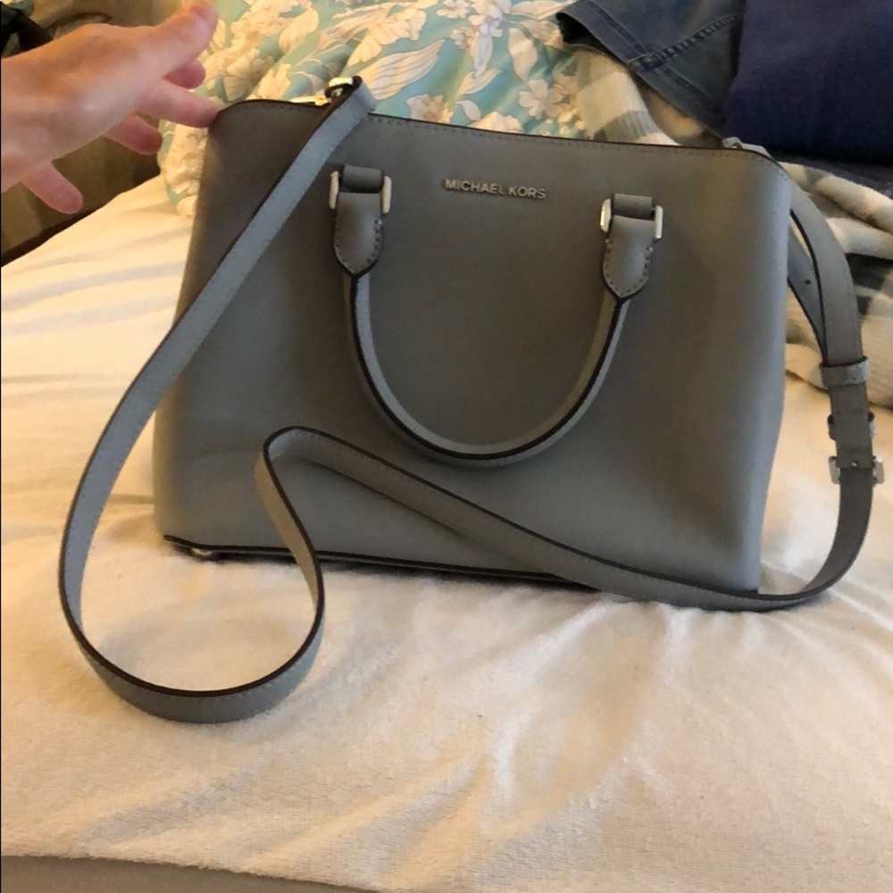 Gray crossbody Michael Kors purse